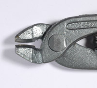 Extreme closeup of the cutting edge of the Japanese glass cutters